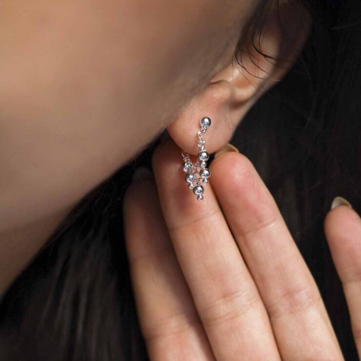 Sterling Silver Hanging Lanterns Chain Studs on model