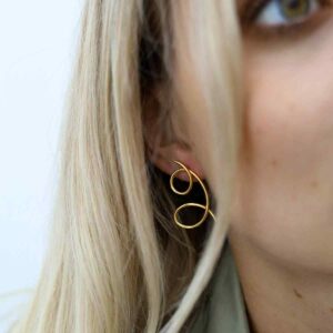 Blonde Model Wearing Gold Plated Silver Double Loop Studs