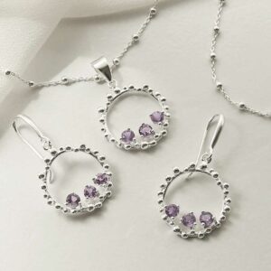 three amethyst gems in water droplets circle dangly earrings and necklace