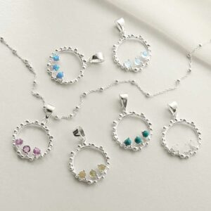 six pairs of three gems in water droplets circle pendants