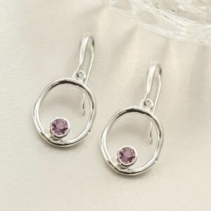 single amethyst gem in oval dangly earrings