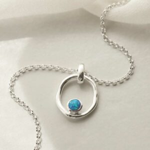 single opalite gem in oval pendant on chain