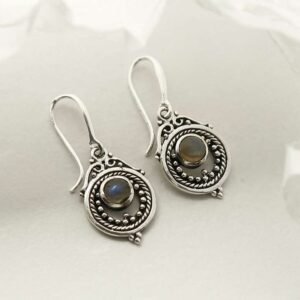 single labradorite gem in decorative dangly earrings