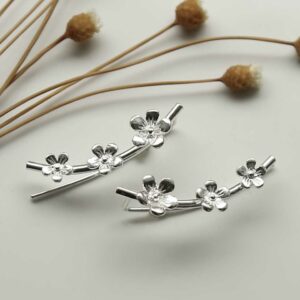 silver three flowers ear climbers front view