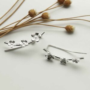 silver three flowers ear climbers side view