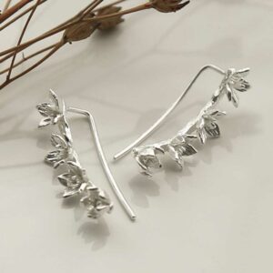 silver four flowers ear climbers strewn