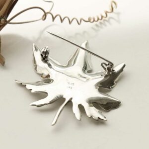 silver maple leaf brooch undone latch