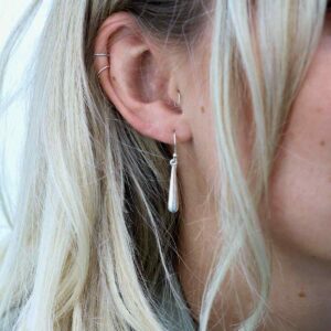 Blonde Model wearing Sterling Silver Baton Earrings