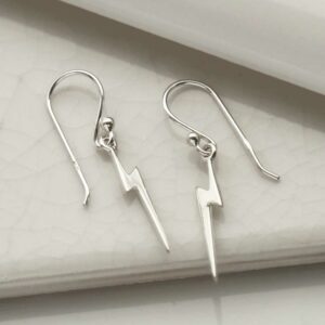 silver lightning dangly earrings strewn