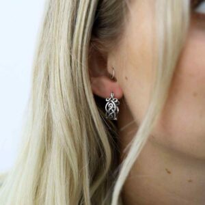 Blonde Model wearing Sterling Silver Celtic Knot Hoops