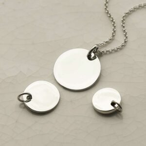 small medium and large silver circle tags