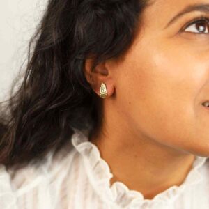 Brunette Model Wearing Gold Plated Silver Hammered Slice Studs