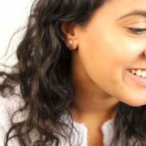 Brunette Model Wearing Rose Gold Plated Silver Hammered Slice Studs