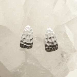 silver hammered triangle studs on crystal background