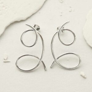 Double Loop studs on plaster prop background