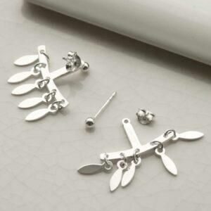 Chandelier Studs on white curved background with one earring undone to show different parts