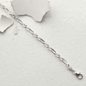 silver long and circle link anklet laid straight