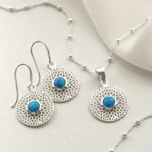 single opalite gems in centre of chrysanthemum necklace and earrings