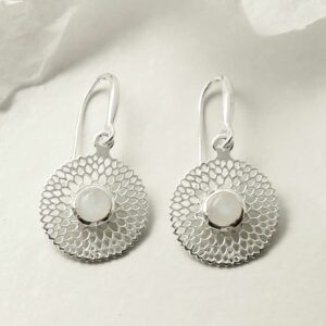 single moonstone gem in centre of chrysanthemum earrings