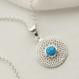 single opalite gem in centre of chrysanthemum pendant