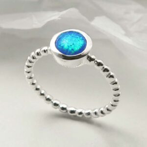 silver beaded band opalite ring upright