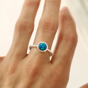 silver beaded band opalite ring on model