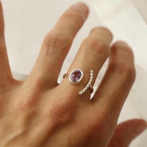 silver adjustable amethyst ring with beaded side on model