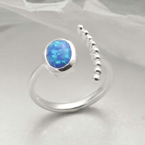 silver adjustable opalite ring with beaded side upright