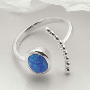 silver adjustable opalite ring with beaded side laid