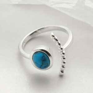 silver adjustable turquoise ring with beaded side laid