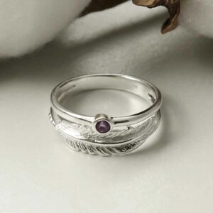 silver amethyst ring with feather band laid