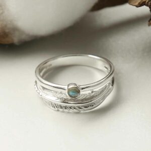 silver labradorite ring with feather band laid