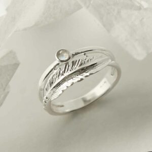 silver moonstone ring with feather band upright