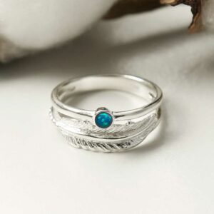 silver opalite ring with feather band laid