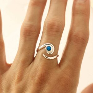 silver adjustable opalite ring with spiral band on model