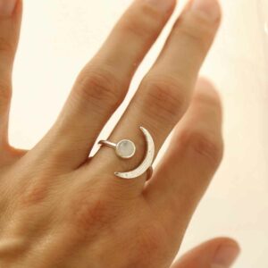 silver adjustable moonstone ring with crescent on model