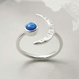 silver adjustable opalite ring with crescent upright