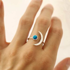 silver adjustable opalite ring with crescent on model