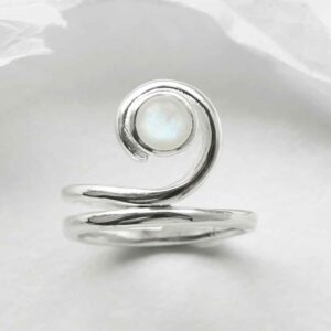 silver winding band moonstone ring laid