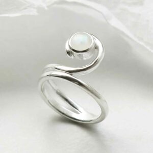 silver winding band moonstone ring upright