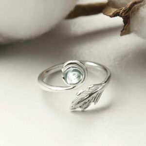 silver adjustable blue topaz ring with leaf laid