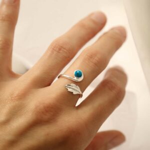 silver adjustable turquoise ring with leaf on model