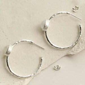 silver textured stud hoops with moonstone side view