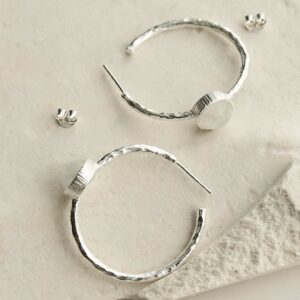 silver textured stud hoops with moonstone top down