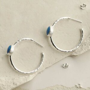 silver textured stud hoops with opalite side view