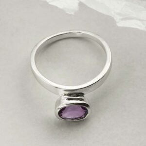 silver amethyst stacking ring laid