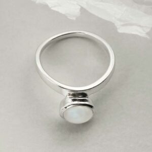 silver moonstone stacking ring laid