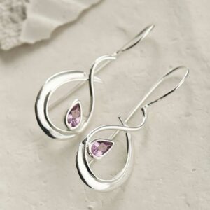 silver large loop drop earrings with amethyst in centre silver large loop drop earrings with amethyst in centre laid