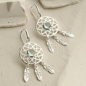 silver dangly dream catcher earrings with centre blue topaz