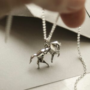 folded paper style horse pendant held on chain